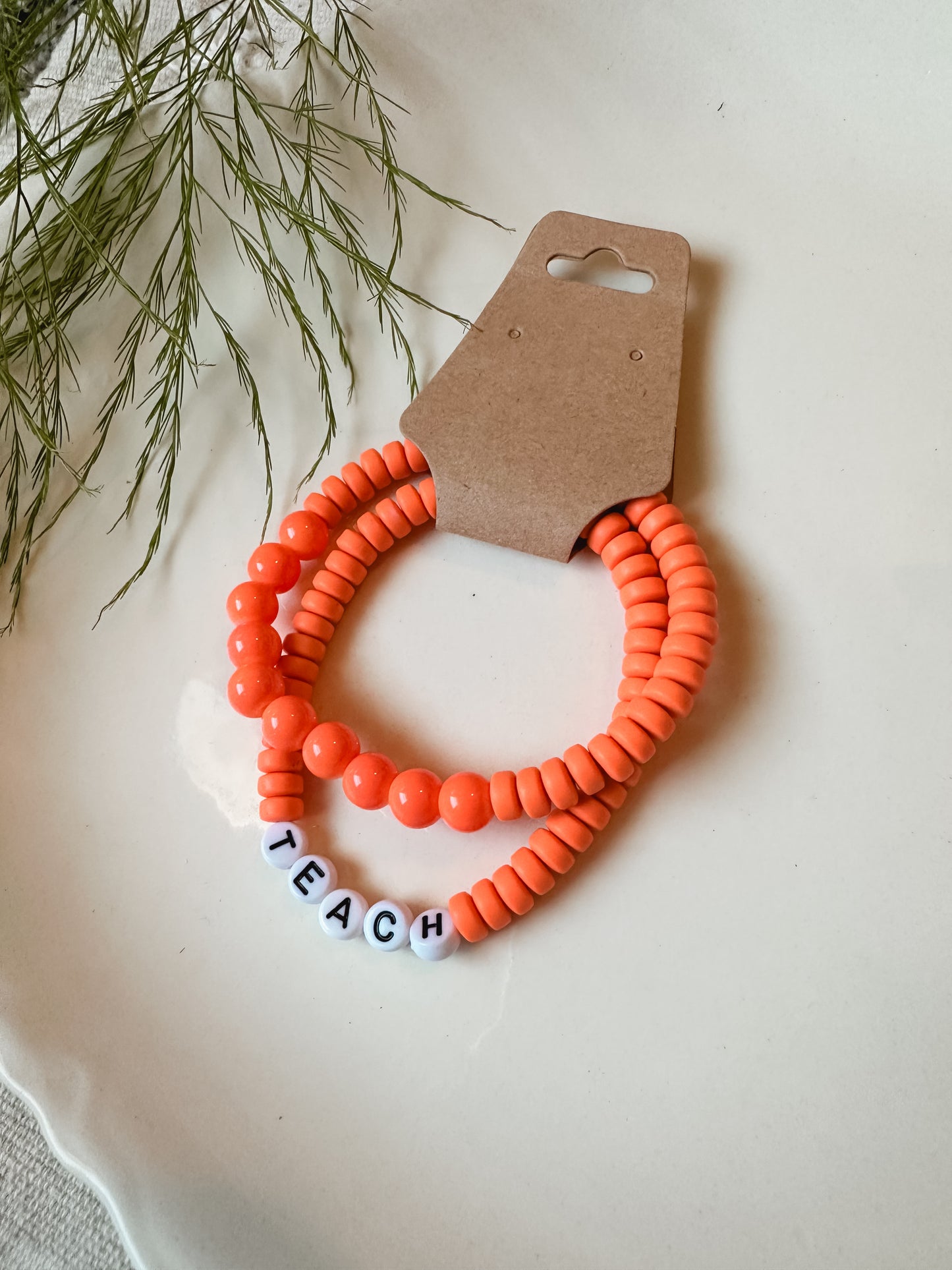 Orange TEACH Stretch Bracelet Set