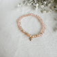 Gold Plated Pink Cross Bracelet